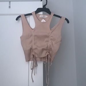 Brand new never worn Bone colored cinch front top.